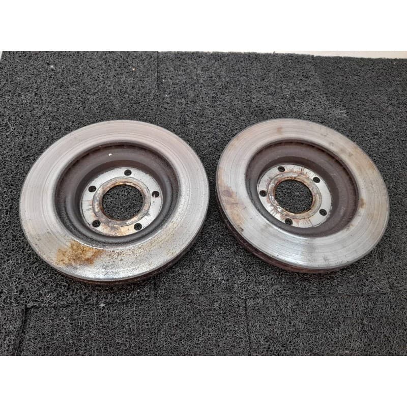 Recambio de disco freno delantero para dodge caliber sxt referencia OEM IAM - Blanco