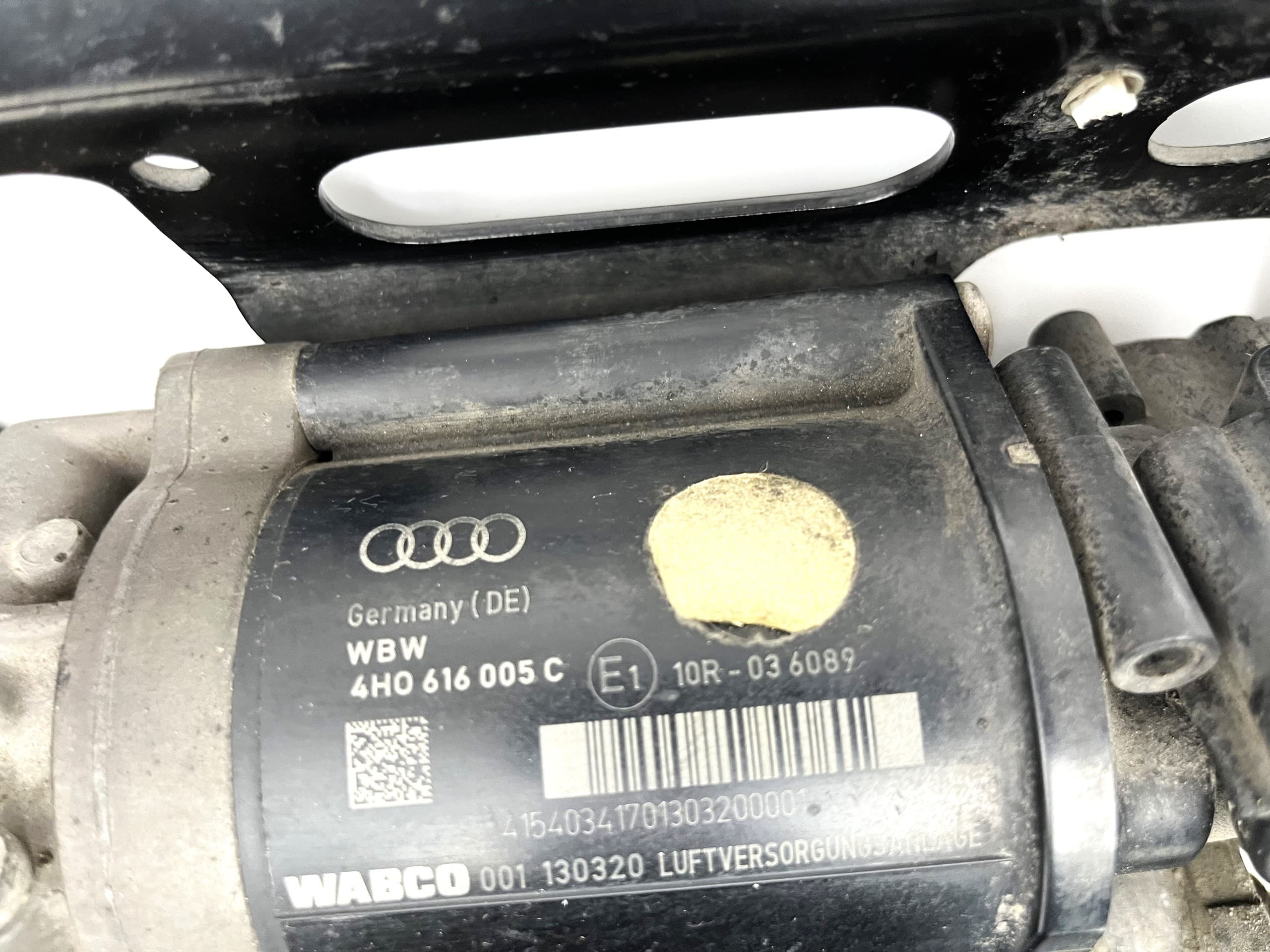 Compresor de suspensión Audi A8 D4 4H0616005C usado 3