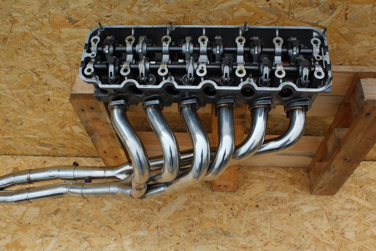 Colector de escape BMW E30 320i 323i 325i 325ix nuevo 9