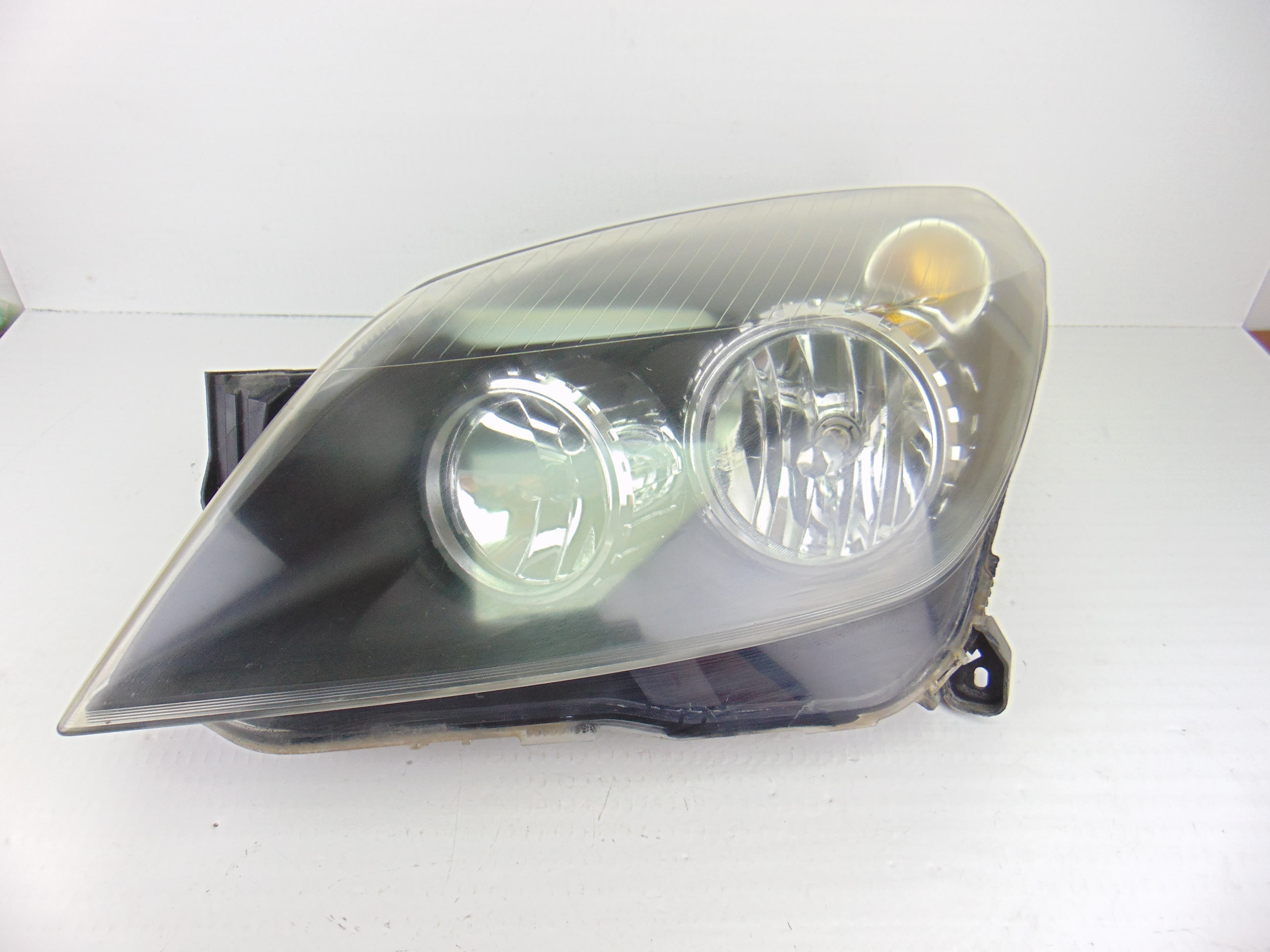 Faro izquierdo, Opel Astra H Twin Top Enjoy 2006 usado