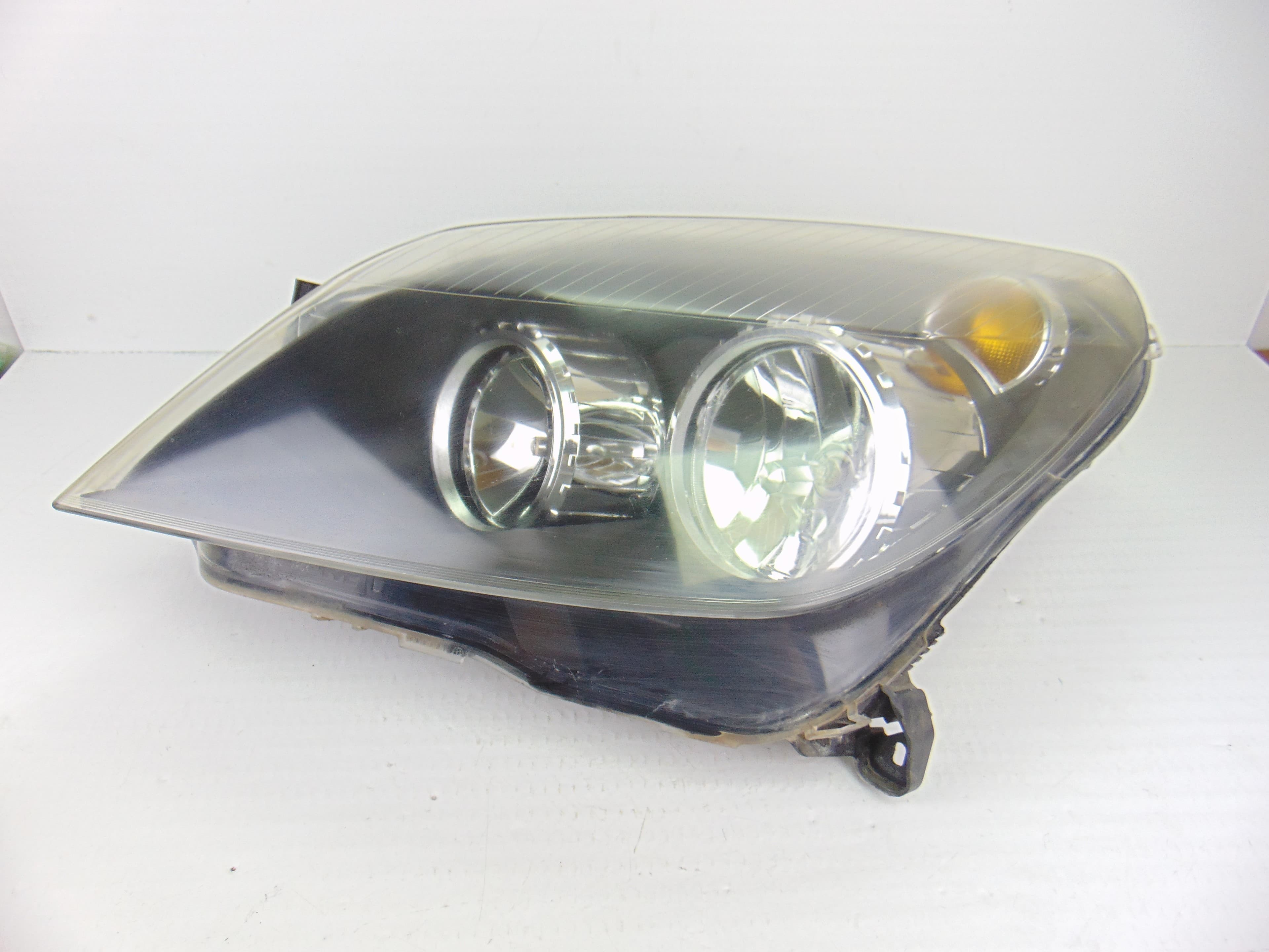 Faro izquierdo, Opel Astra H Twin Top Enjoy 2006 usado 3