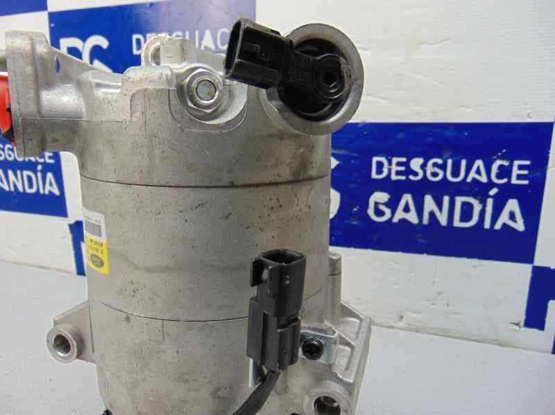 Compresor aire acondicionado, DV61-19D629-F2A usado 4