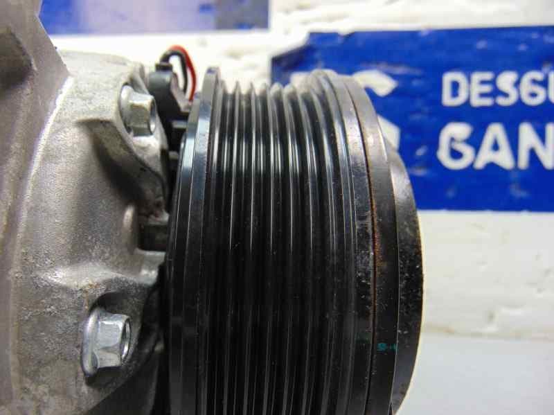 Compresor aire acondicionado, DV61-19D629-F2A usado 8