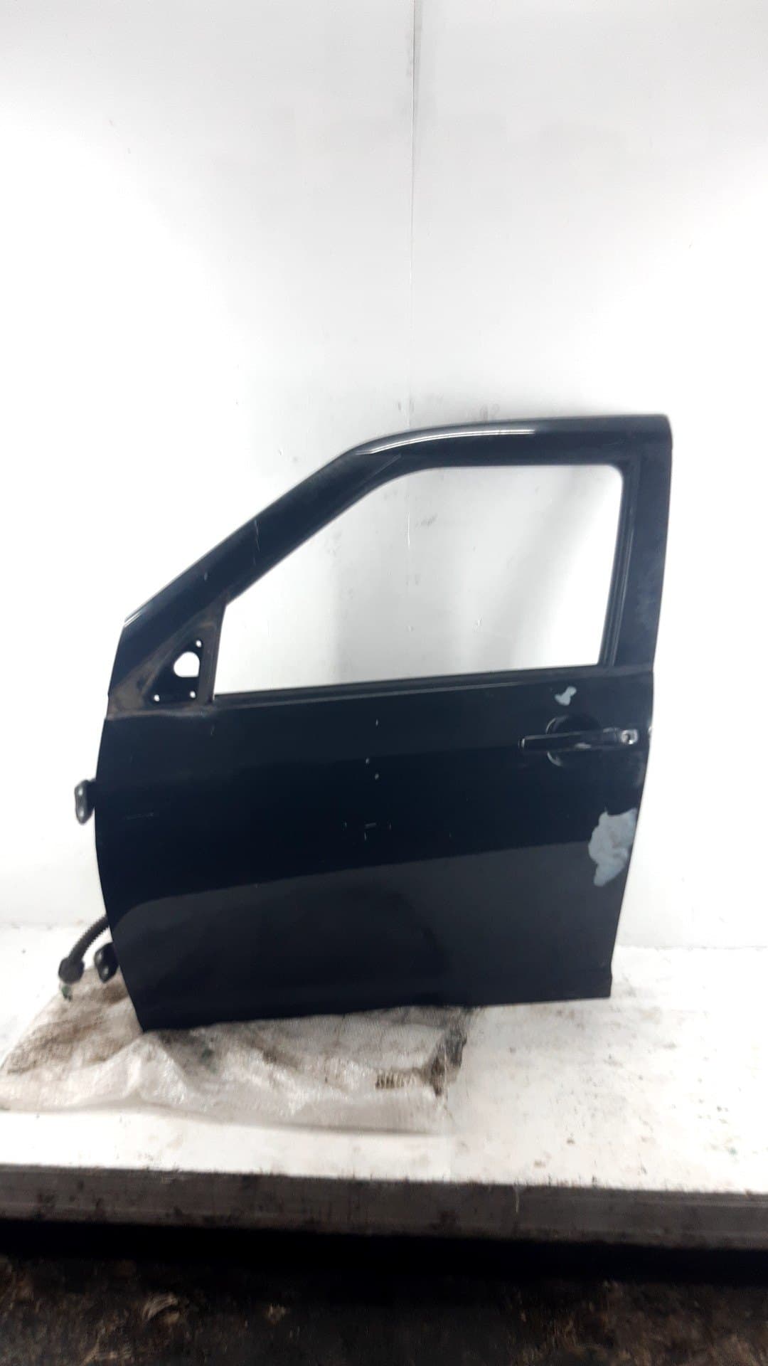 Puerta delantera izquierda SUZUKI SWIFT SF BERLINA (EA)
