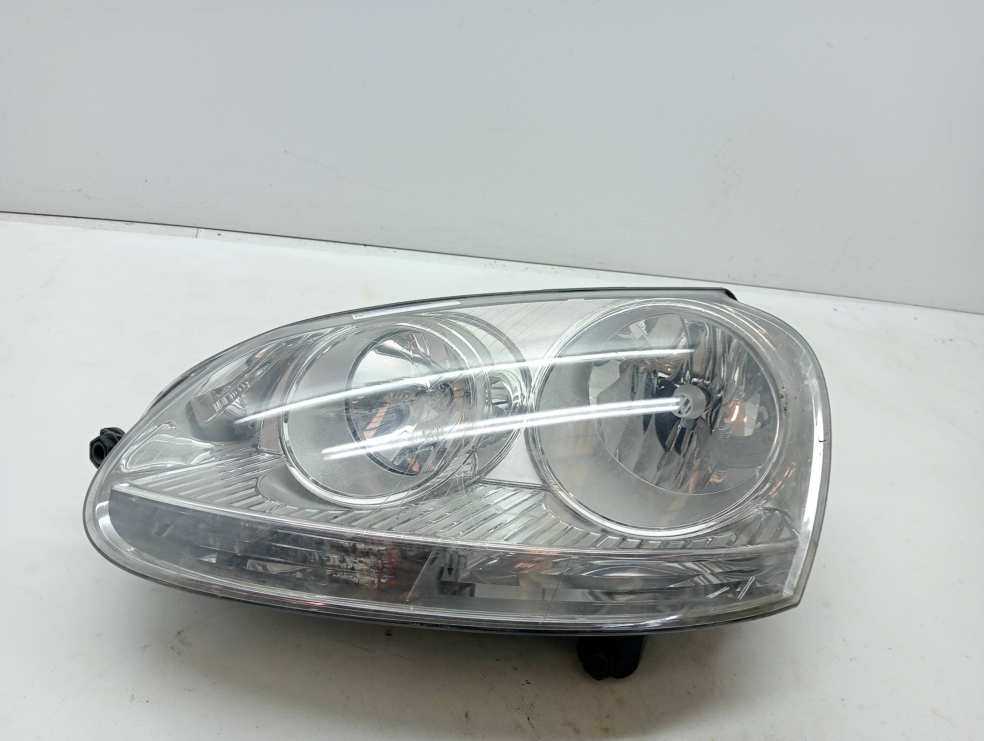 Faro izquierdo VOLKSWAGEN GOLF V BERLINA (1K1)