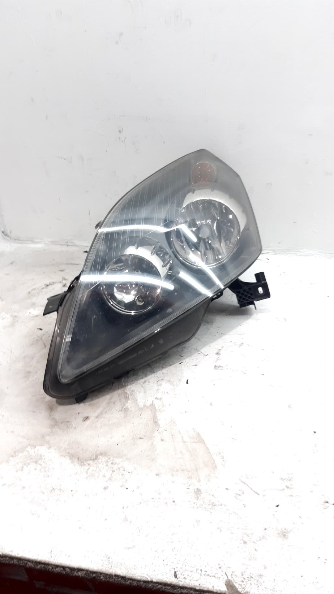 Faro izquierdo OPEL ZAFIRA B
