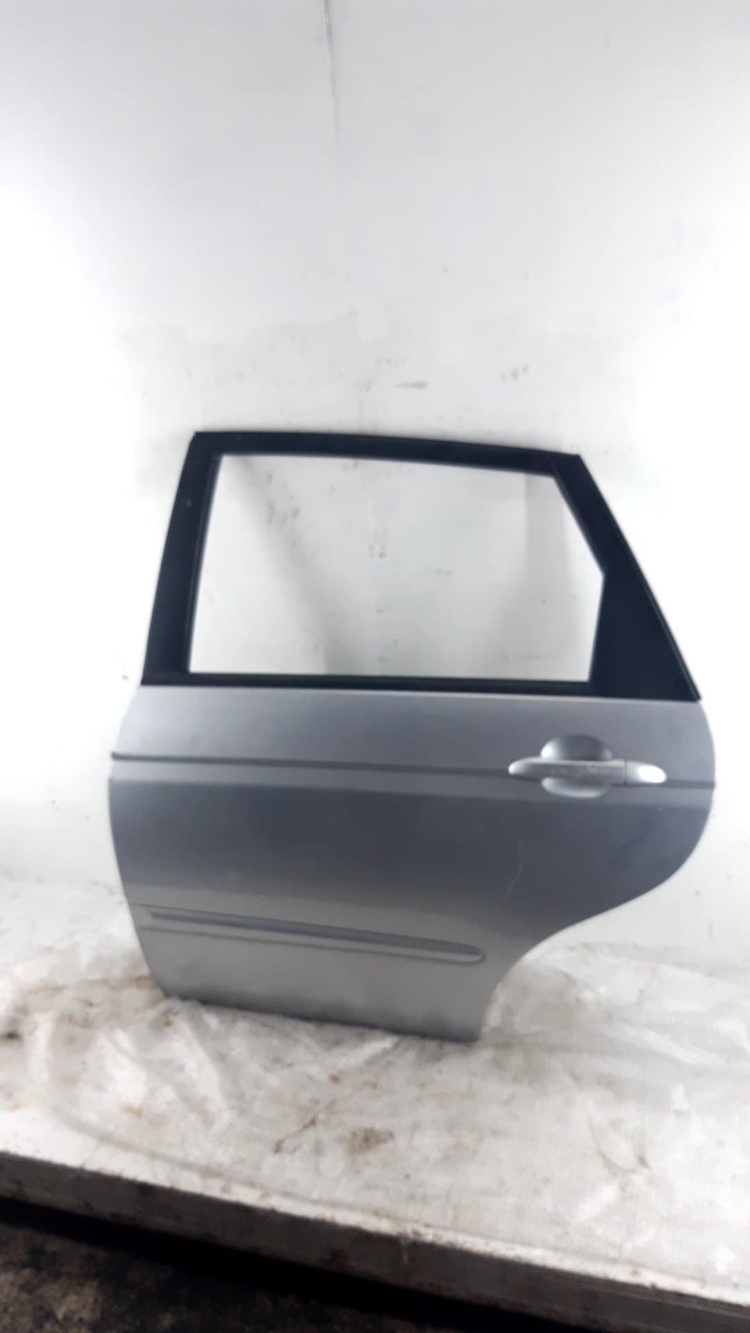 Puerta trasera izquierda KIA CERATO
