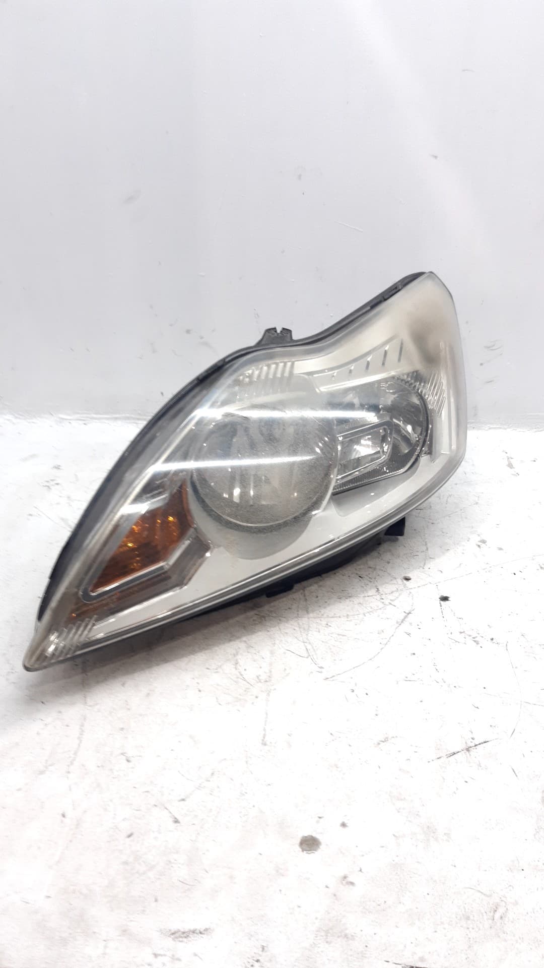 Faro izquierdo FORD FOCUS BERLINA (CAP)