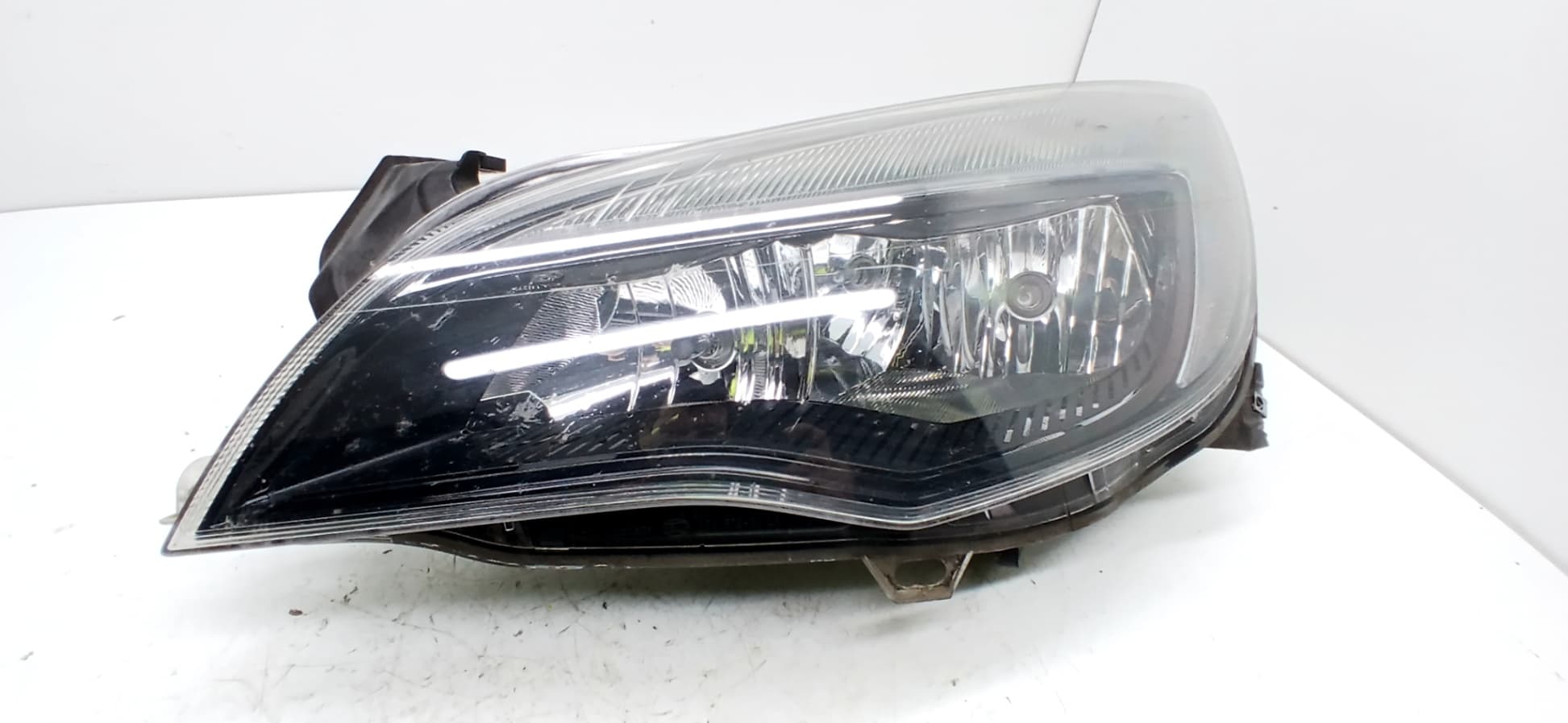 Faro izquierdo OPEL ASTRA J LIM.