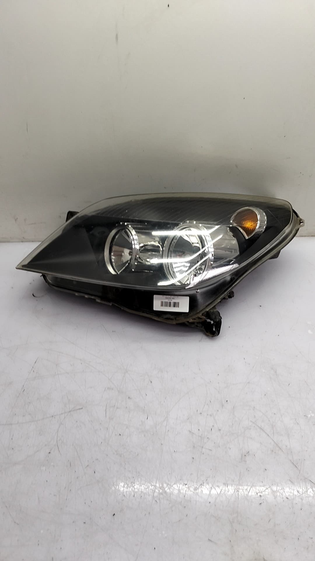 Faro izquierdo OPEL ASTRA H BER.