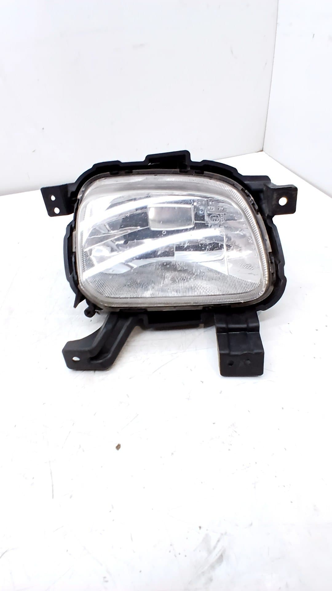 Faro antiniebla izquierdo KIA CARENS