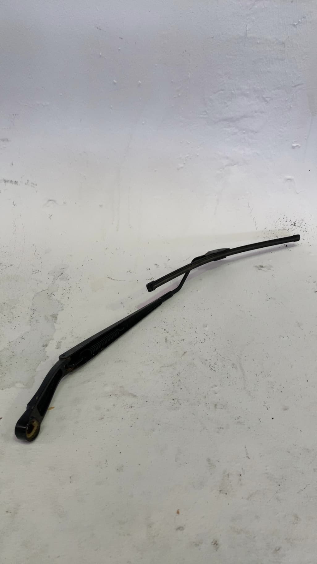 Brazo limpia delantero izquierdo NISSAN NV 200 (M20) 2
