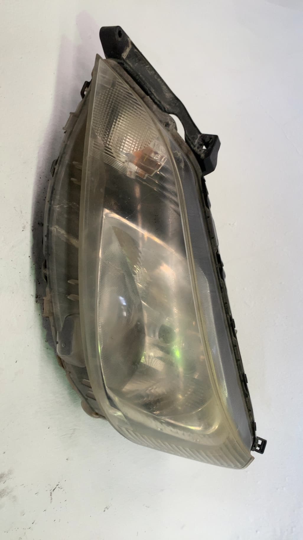 Faro izquierdo NISSAN NV 200 (M20)