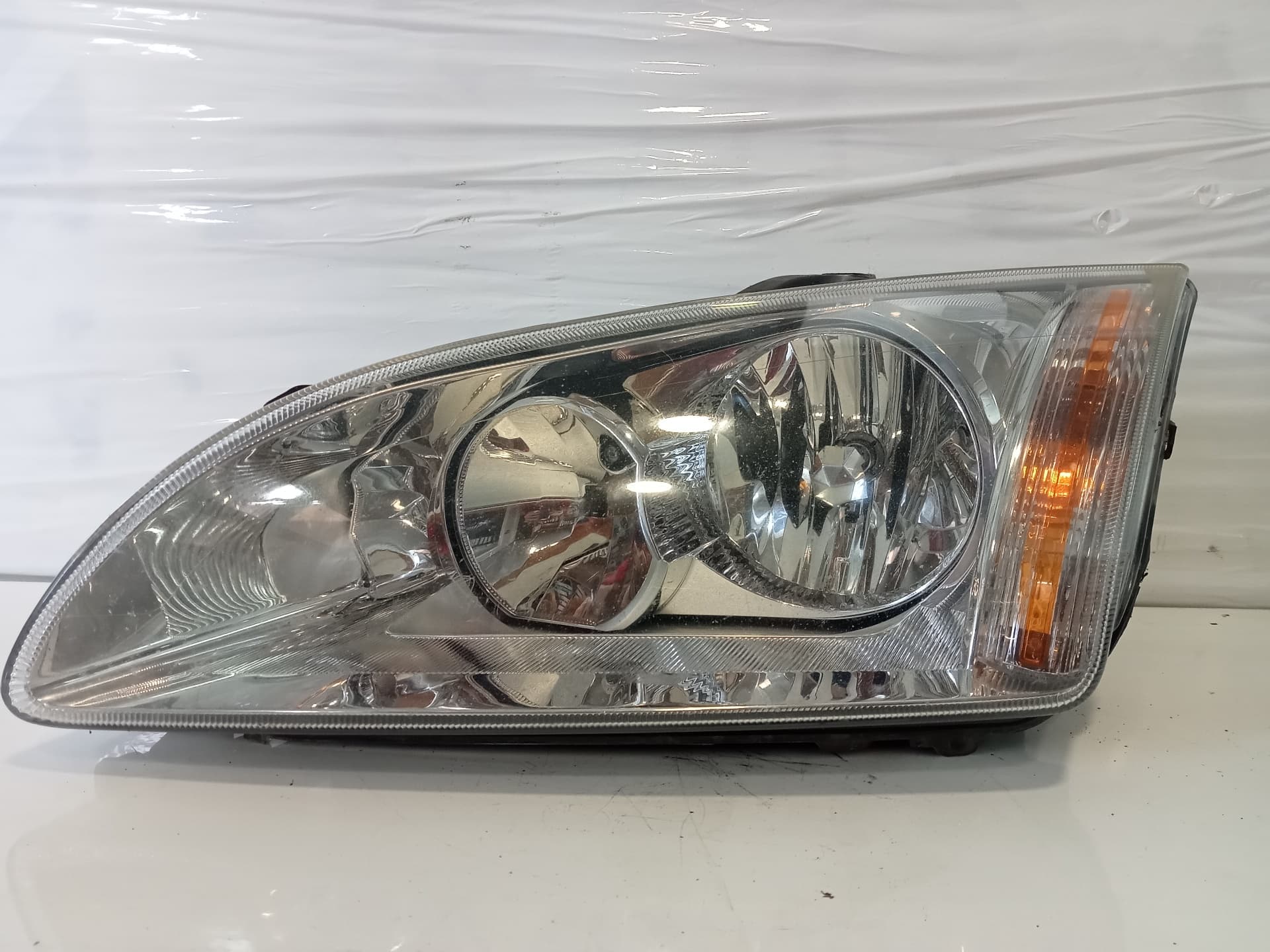 Faro izquierdo FORD FOCUS BERLINA (CAP) 3