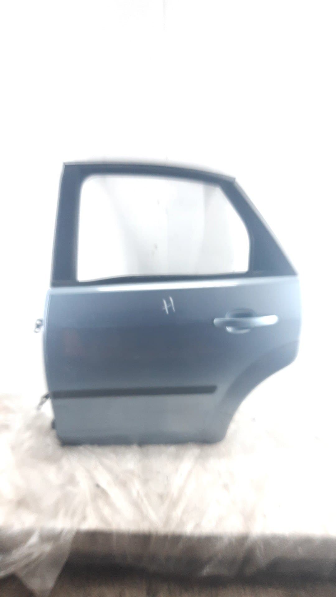 Puerta trasera izquierda FORD FOCUS BERLINA (CAP)