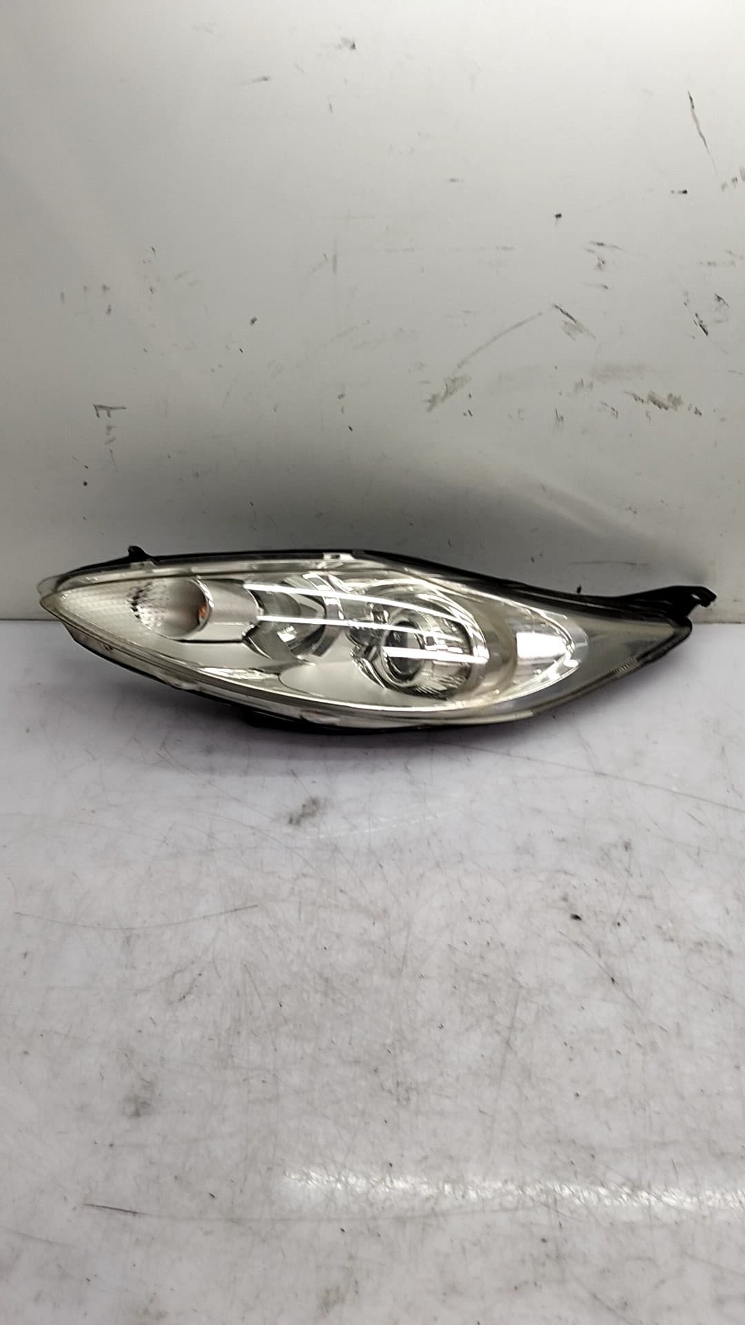 Faro izquierdo FORD FIESTA (CE1)