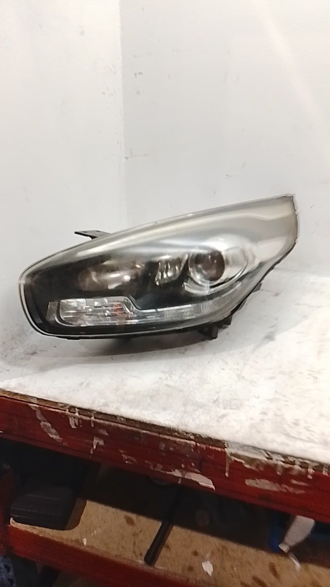 Faro izquierdo KIA CARENS