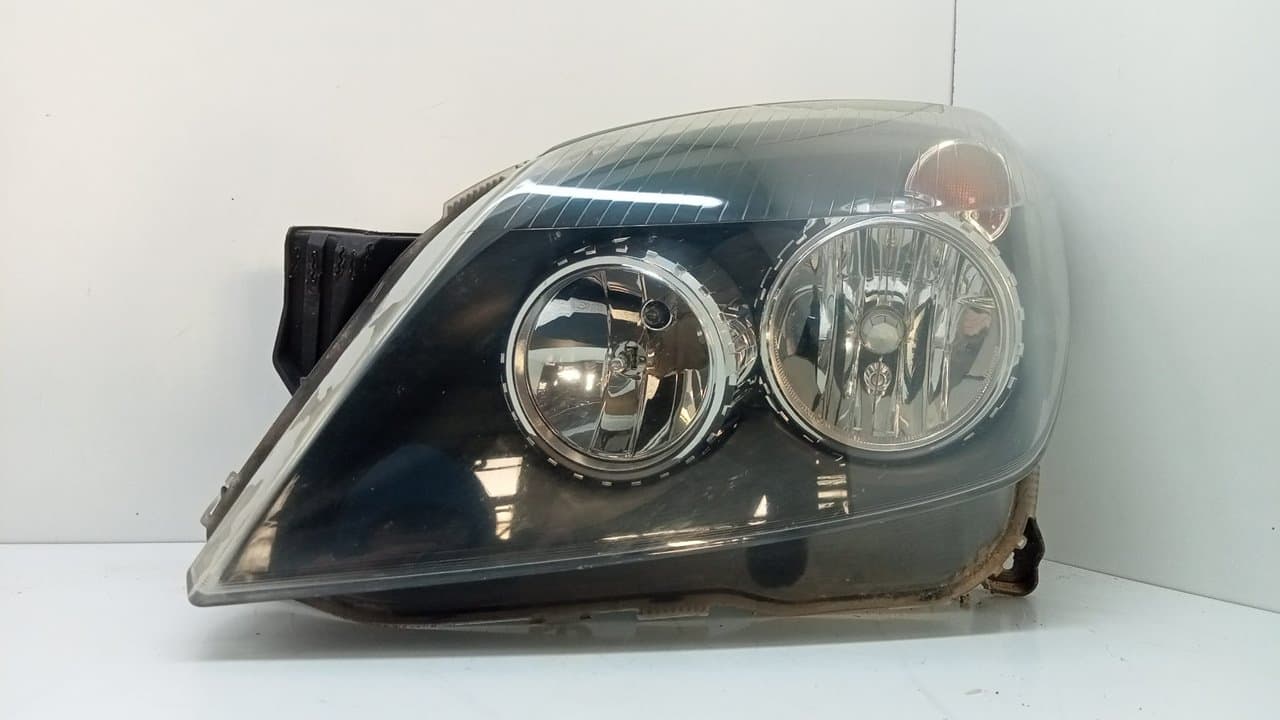 Faro izquierdo OPEL ASTRA H BERLINA