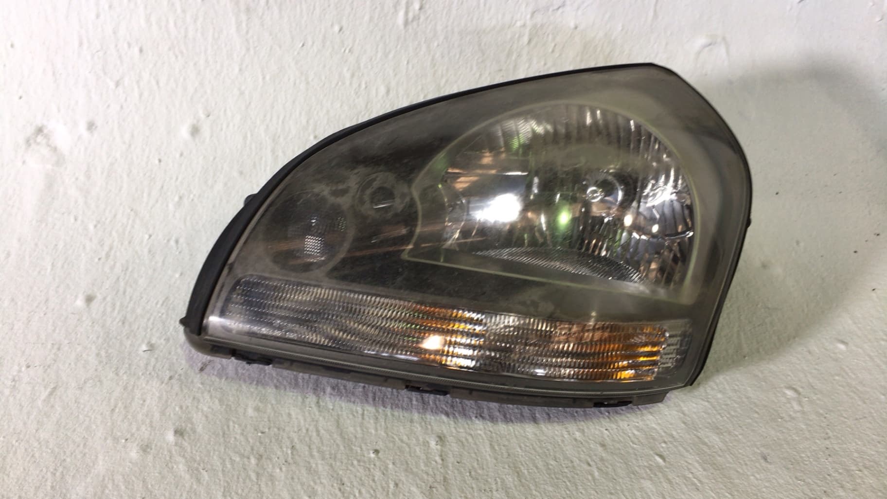 Faro izquierdo HYUNDAI TUCSON (JM)