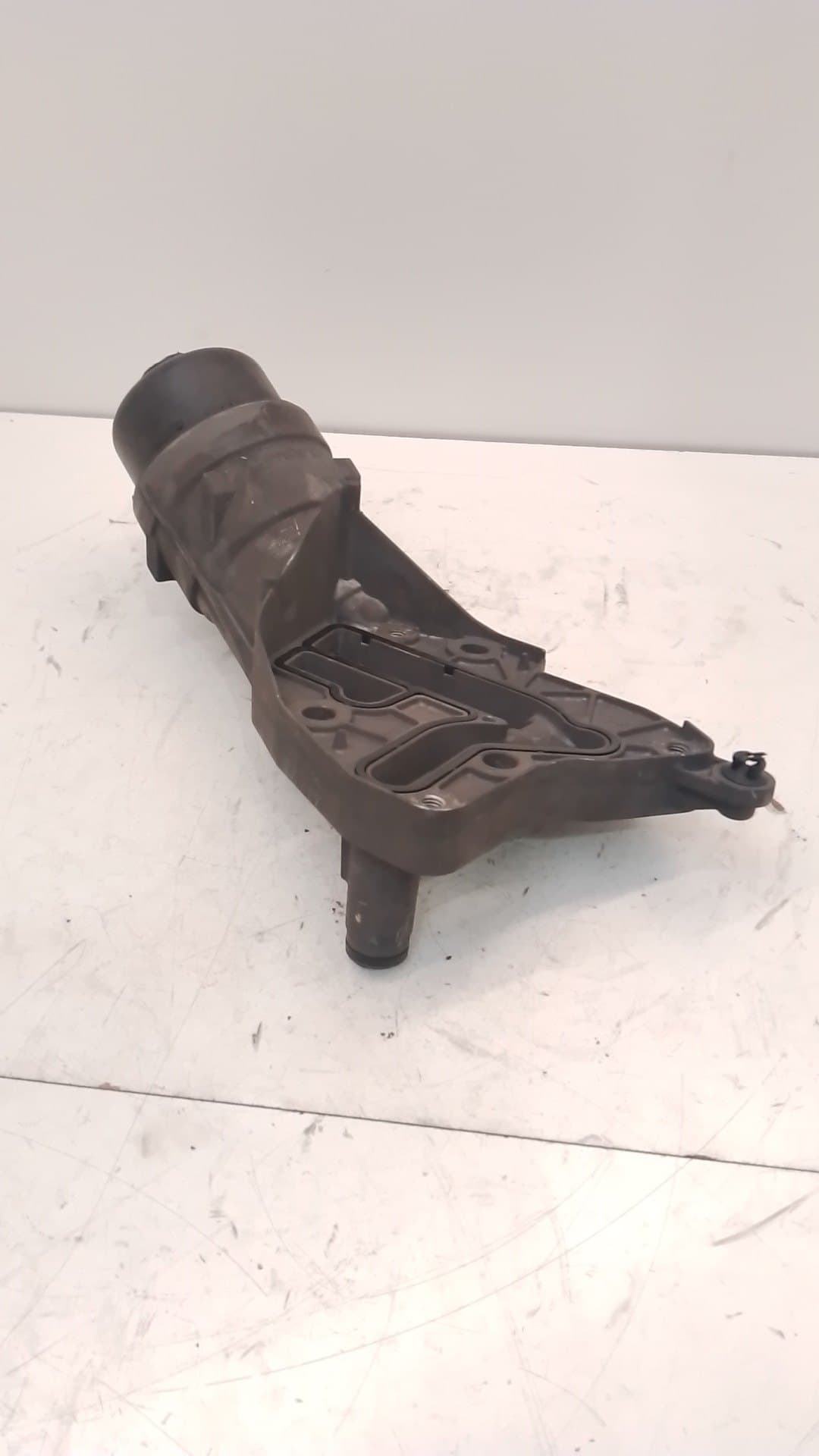 Soporte filtro aceite OPEL ASTRA J LIM.