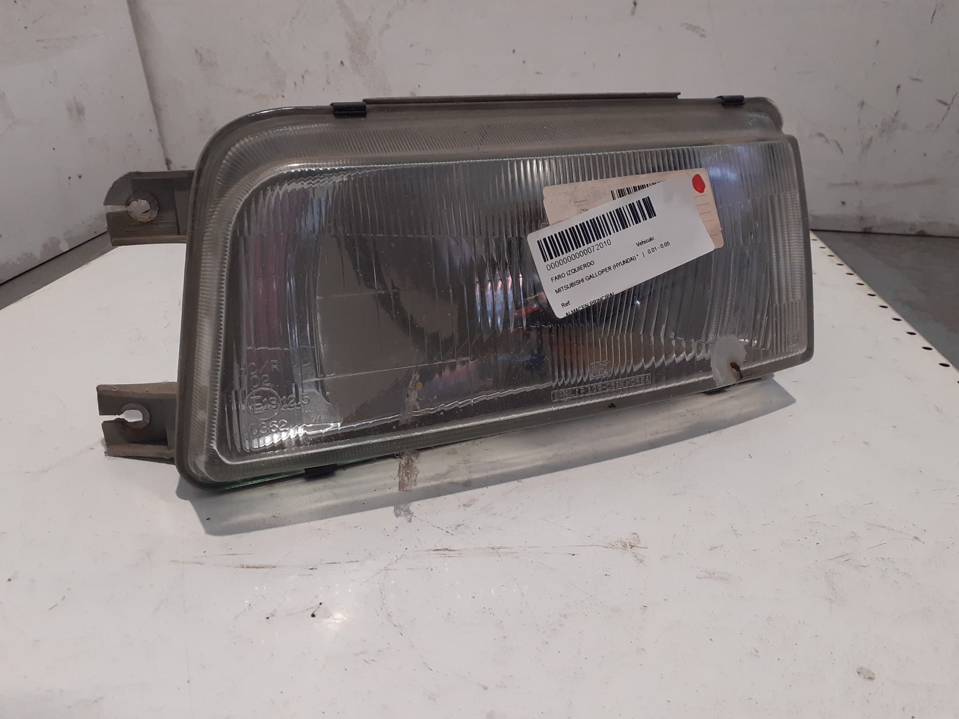 Faro izquierdo MITSUBISHI CARISMA BERLINA 4 (DA0)