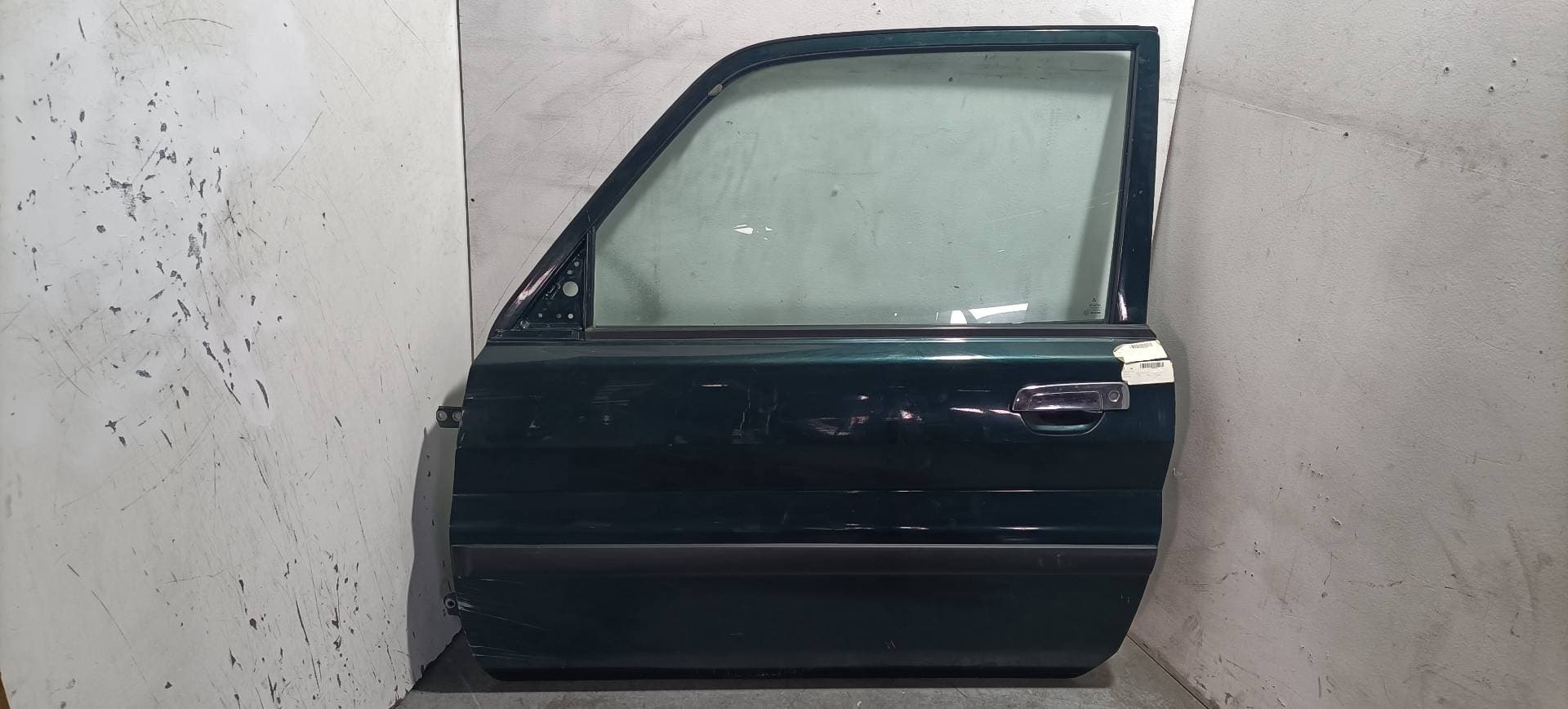 Puerta delantera izquierda MITSUBISHI MONTERO PININ (H60/H70)