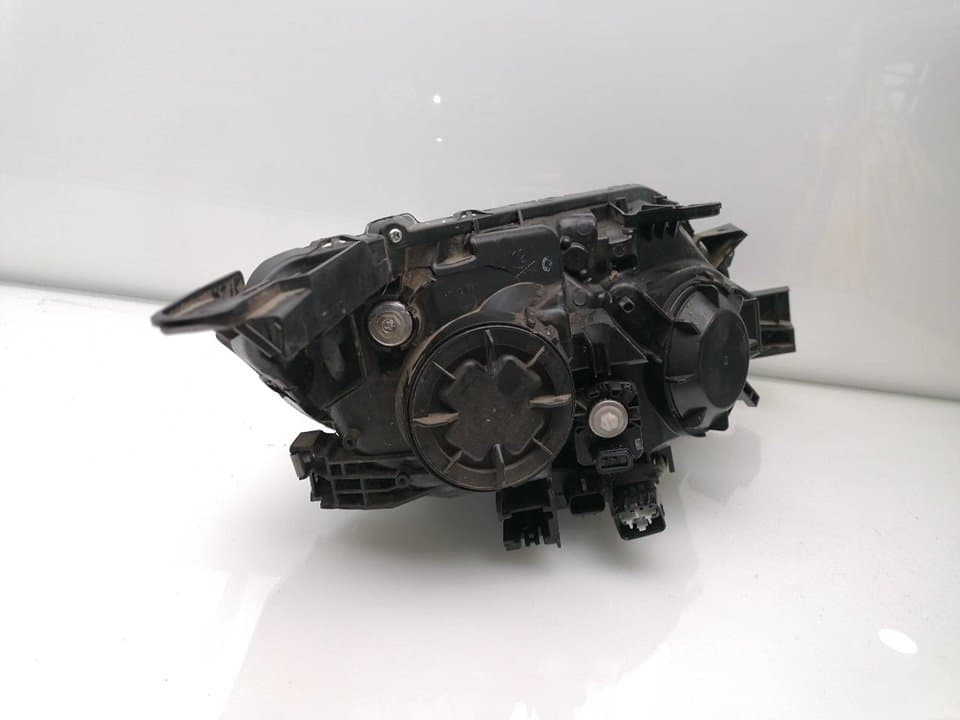 Faro izquierdo MITSUBISHI L 200 (K6/7) 2