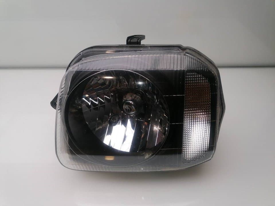 Faro izquierdo SUZUKI JIMNY SN (FJ)