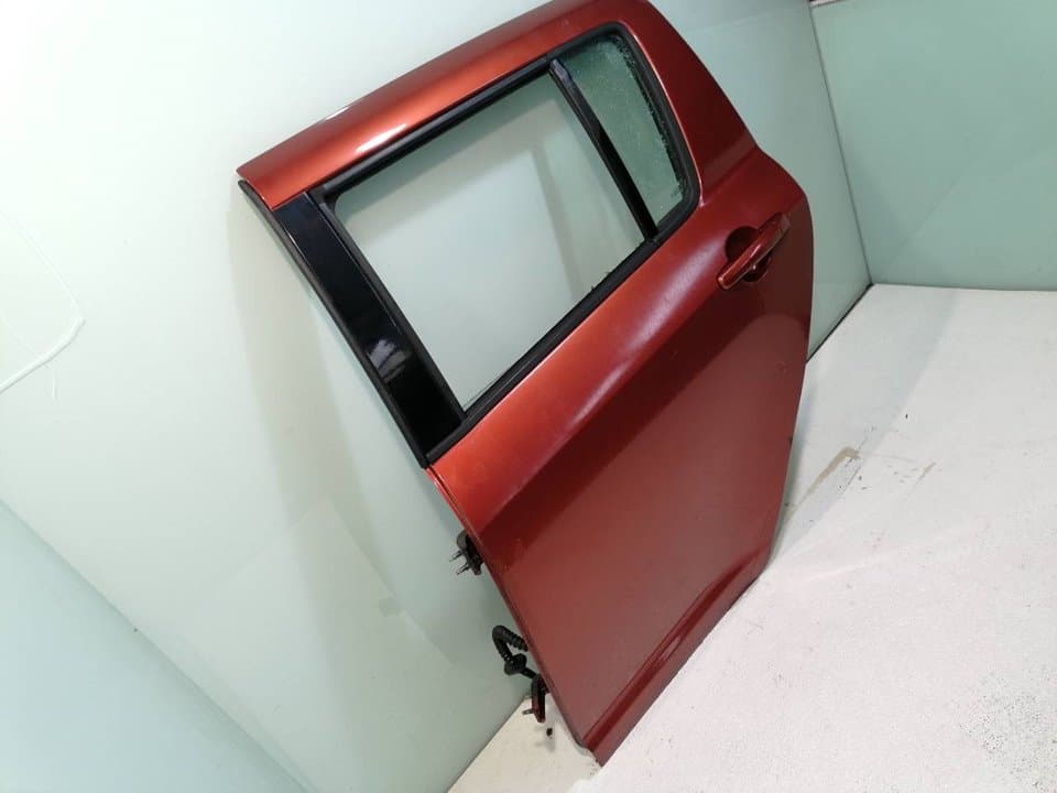 Puerta trasera izquierda SUZUKI SWIFT SF BERLINA (EA) 4