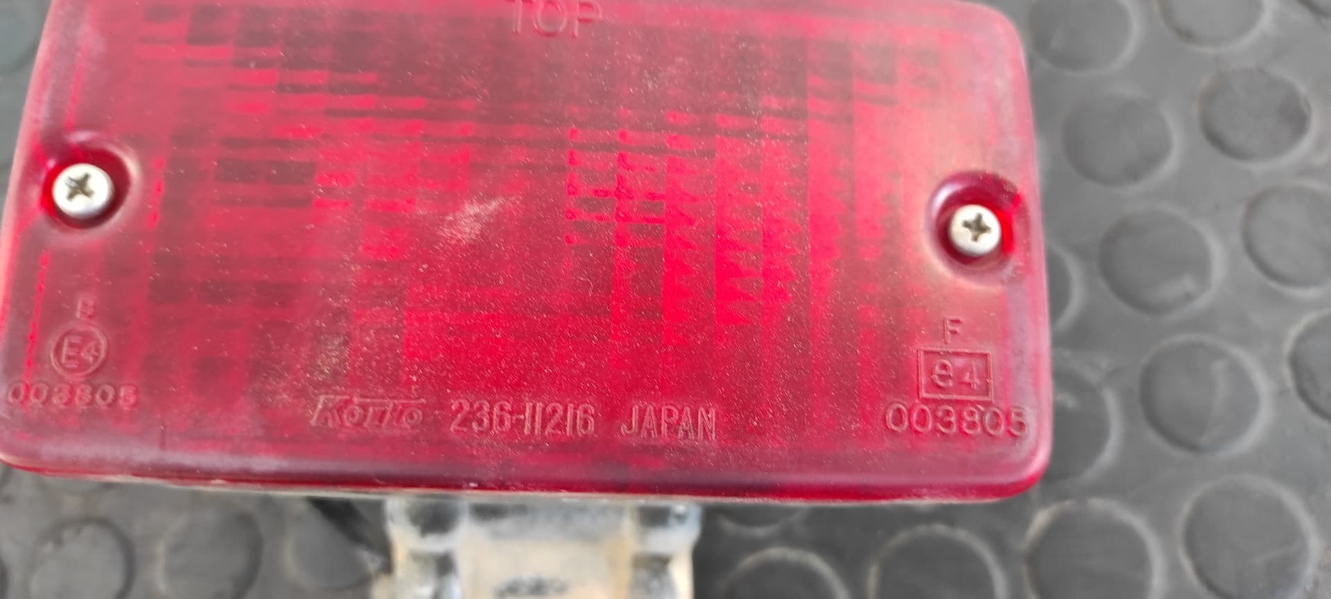 Recambio de FARO ANTINIEBLA TRASERO IZQUIERDO para MITSUBISHI MONTERO (L040) 2500 TD (2-ptas.) 4D56 referencia OEM IAM 23611216   - PLATA 2