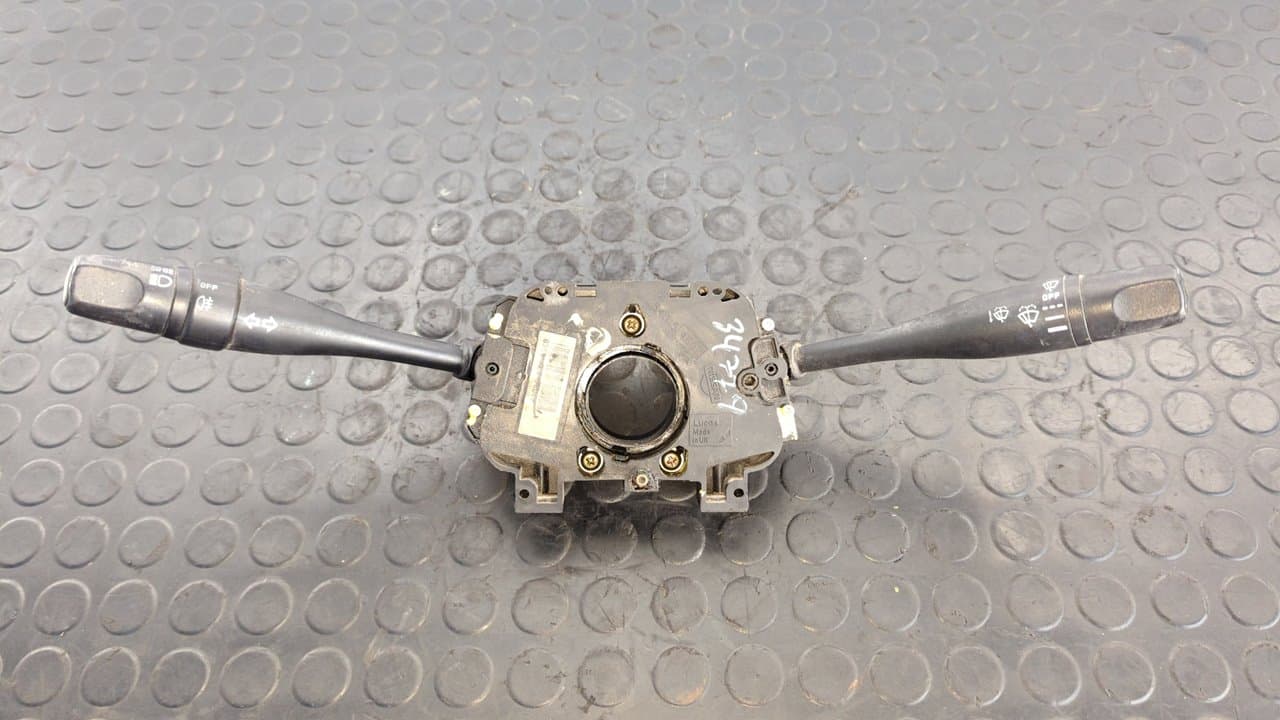 Recambio de MANDO MULTIFUNCION para NISSAN VANETTE CARGO (HC23) Familiar (5 asientos) LD23 referencia OEM IAM 54034812   - BLANCO