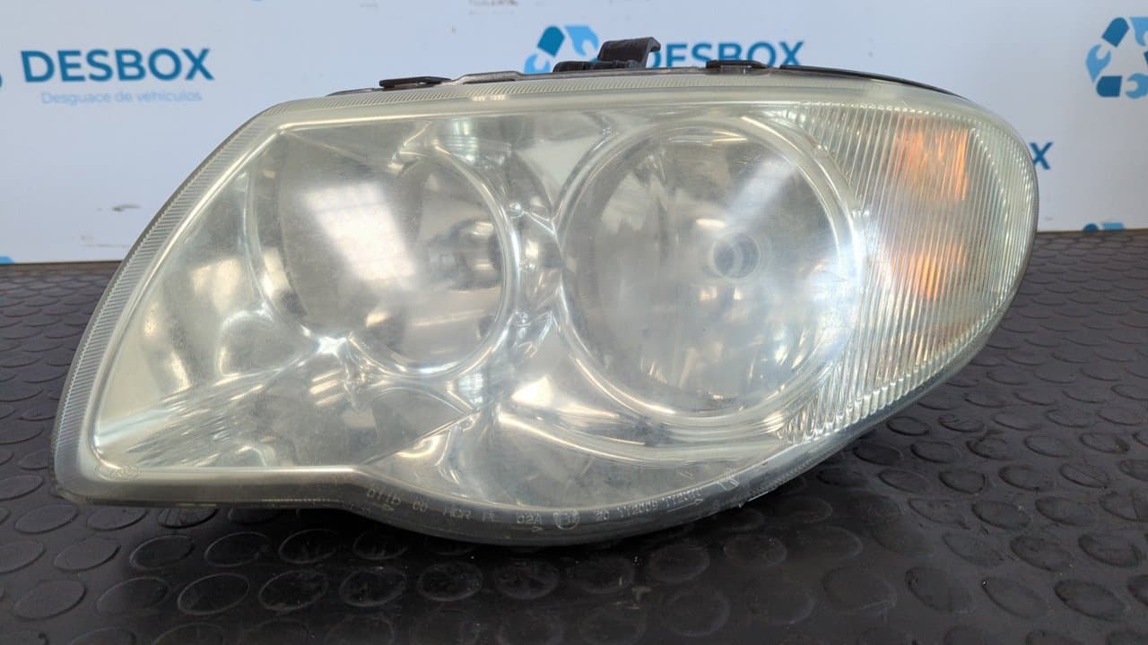 Recambio de FARO IZQUIERDO para CHRYSLER VOYAGER (RG) 2.5 CRD Executive VM07C referencia OEM IAM  04857831AC - GRIS