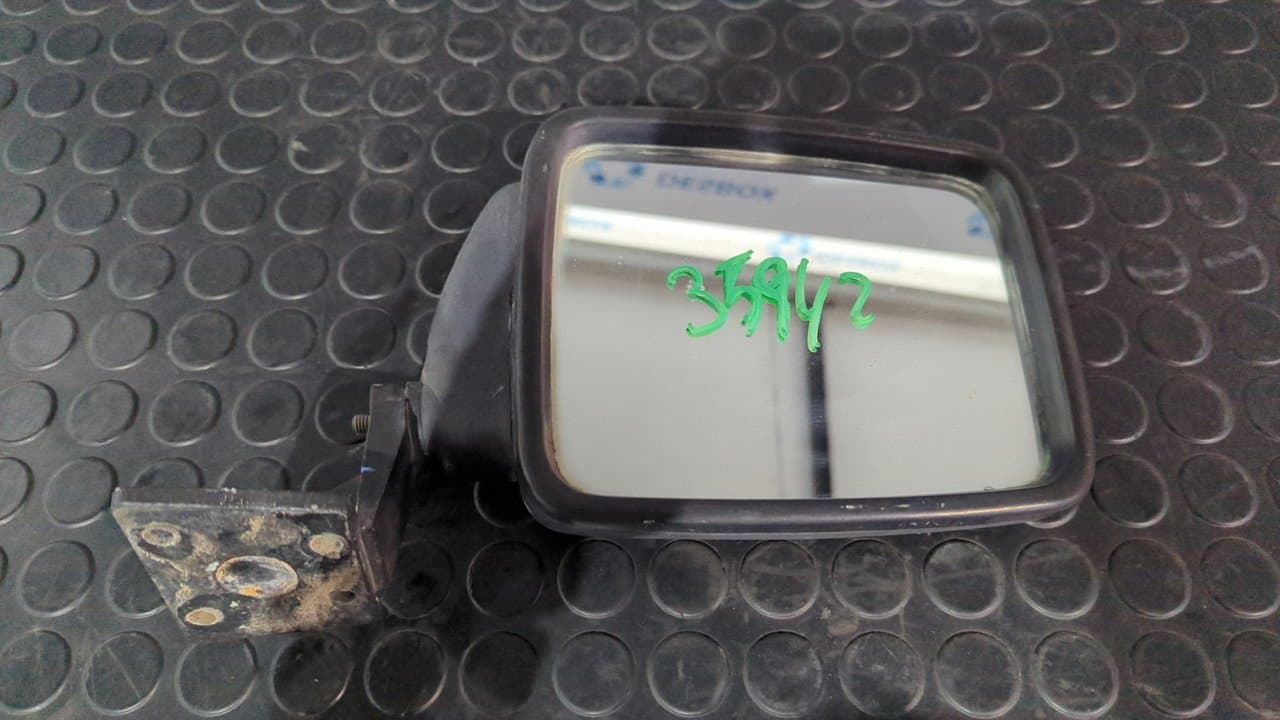 Recambio de RETROVISOR IZQUIERDO para SUZUKI SAMURAI (SJ) Hardtop G13B referencia OEM IAM 86/562-02 - AZUL
