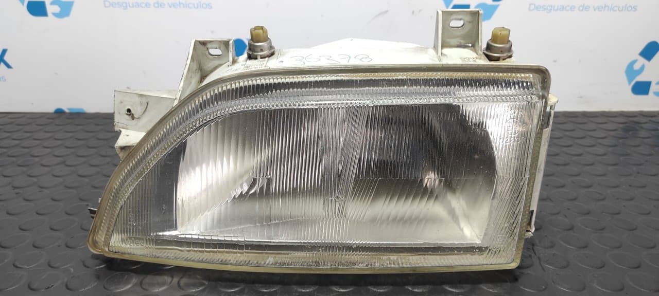 Recambio de FARO IZQUIERDO para FORD ESCORT BERLINA/TURNIER Bravo Lim. L1E referencia OEM IAM 7R01472 - VERDE