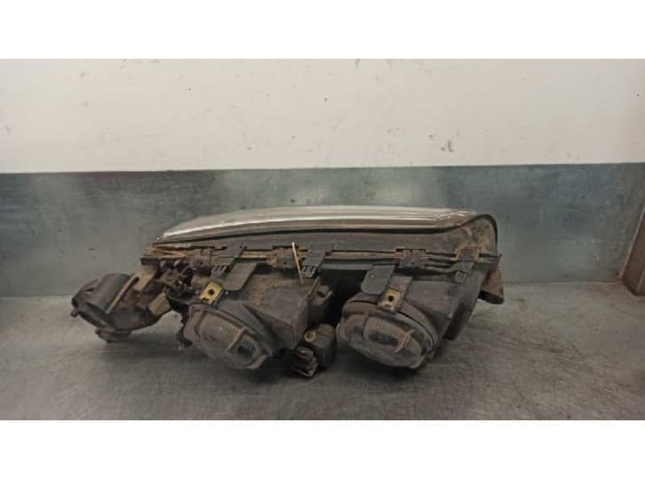 Recambio de faro izquierdo para volvo s80 i (184) 2.5 tdi referencia OEM IAM 89004438 2