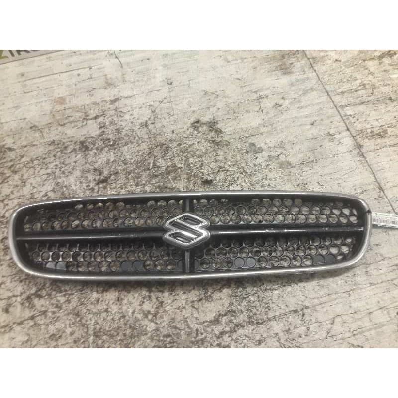 Recambio de rejilla delantera central para suzuki baleno fam. sy (eg) 1.6 glx se referencia OEM IAM - Rojo