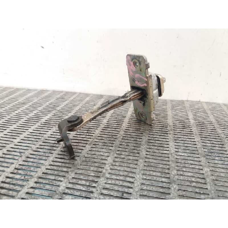 Recambio de retenedor puerta delantera izquierda para kia sephia ll 1.5 cat referencia OEM IAM - Verde