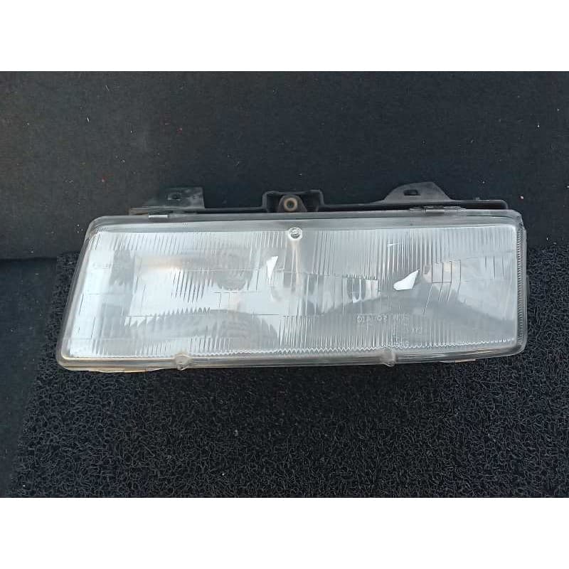 Recambio de faro izquierdo para opel pontiac trans sport referencia OEM IAM 121782