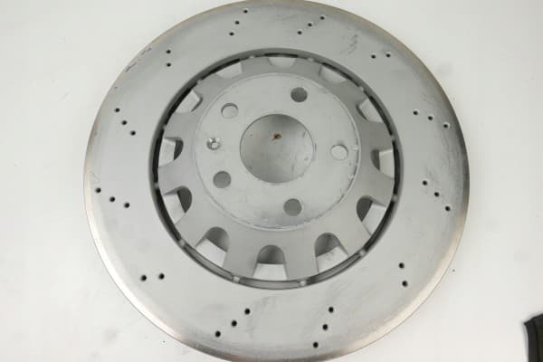 Disco de freno Zimmermann 100.3383.70 delantero ventilado perforado usado