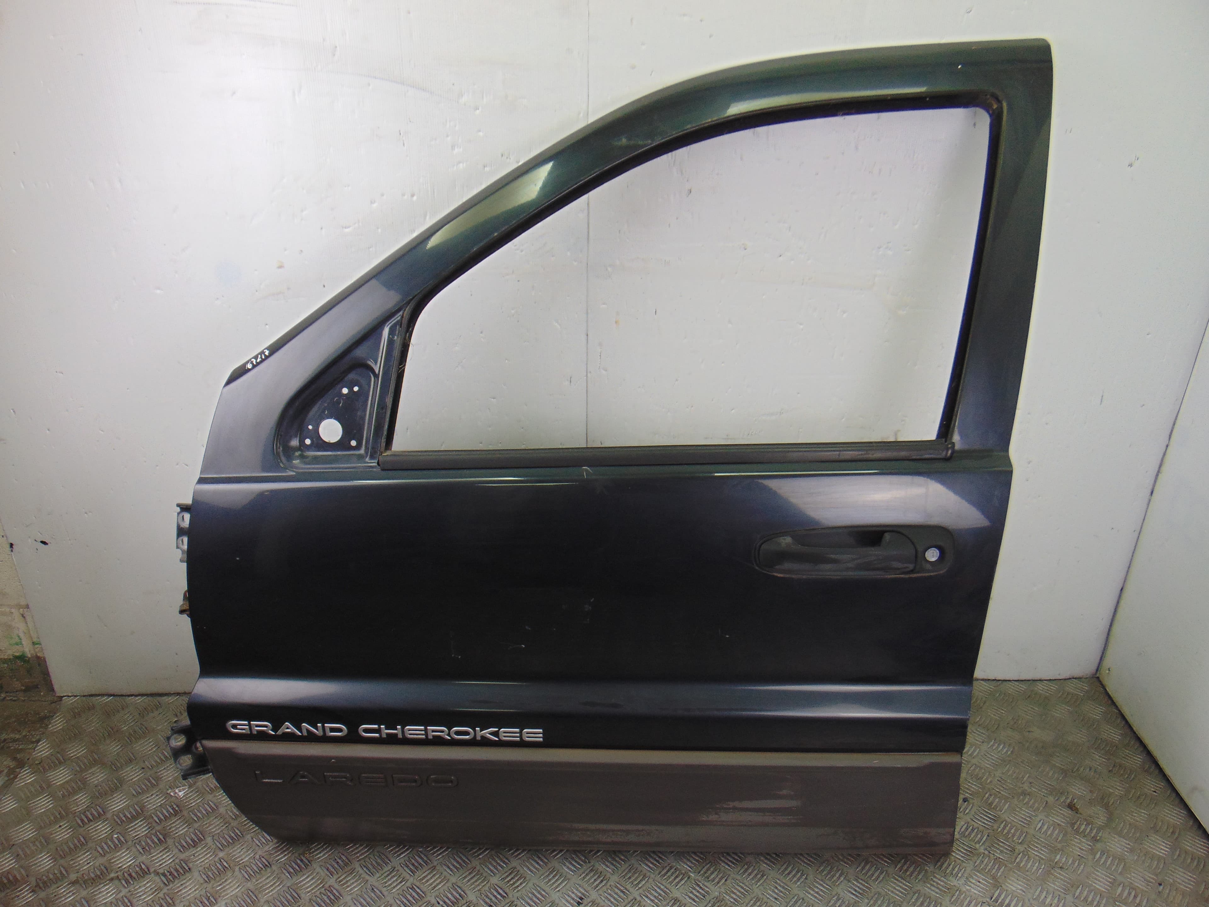 Puerta delantera izquierda, Jeep Grand Cherokee (Wj/wg) 3.1 TD Laredo 1999 usado